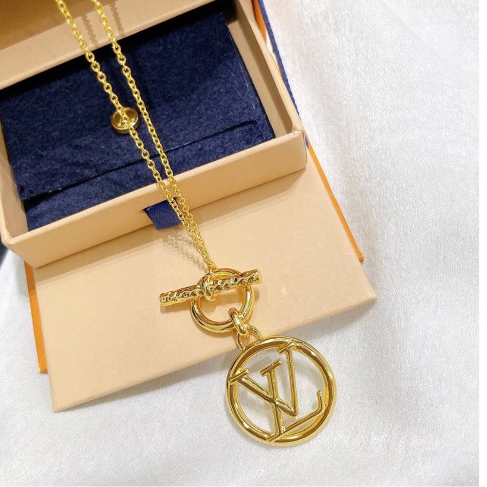Louis Vuitton Pendant Necklace. Comes in black jewelry bag.